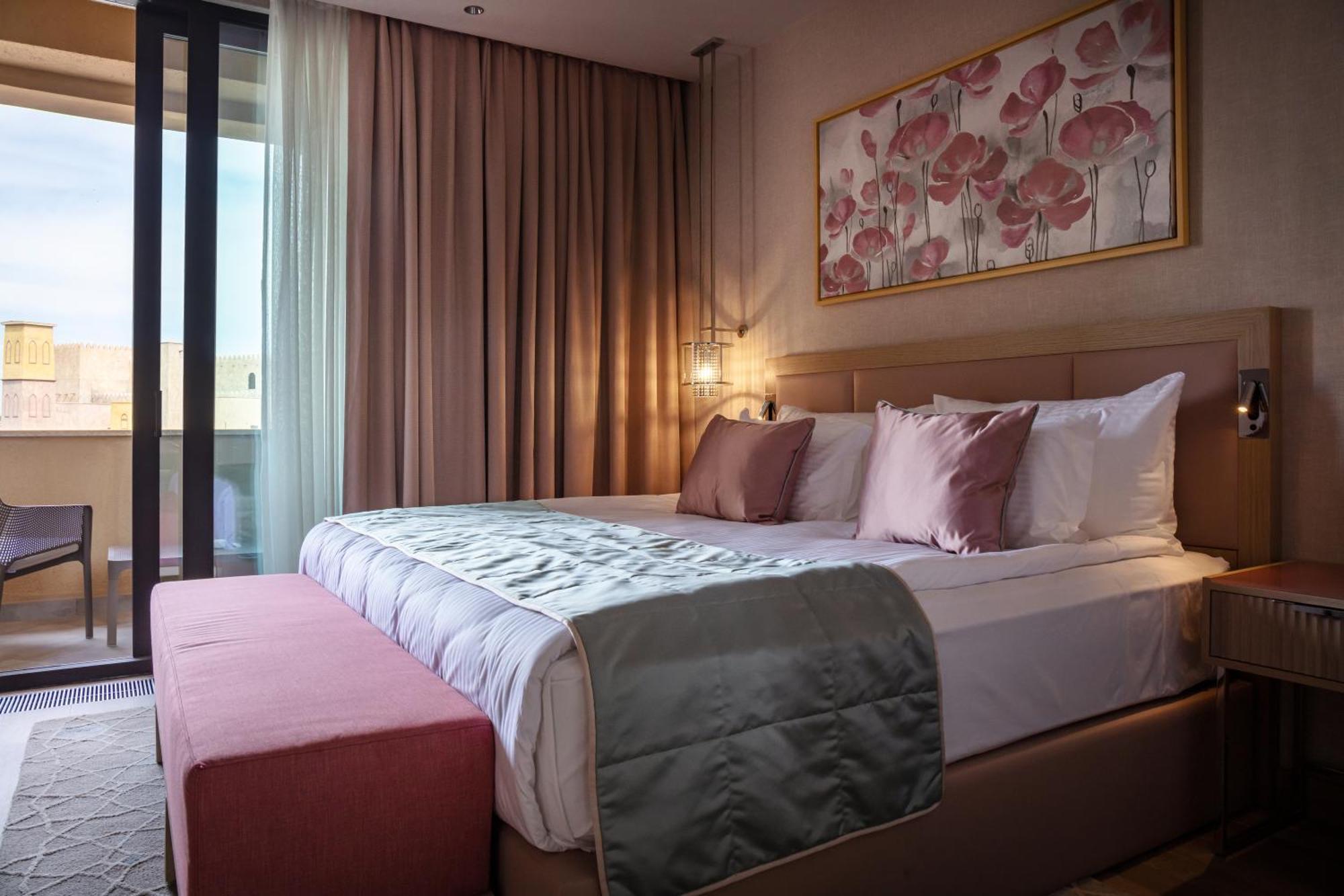 Karavansaray Turkistan Harbour Hotel -Flying Theatre Access Exterior foto A bedroom at the hotel